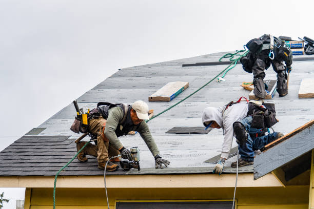 Professional Storm Damage Roof Repair technician working in Loudon, NH